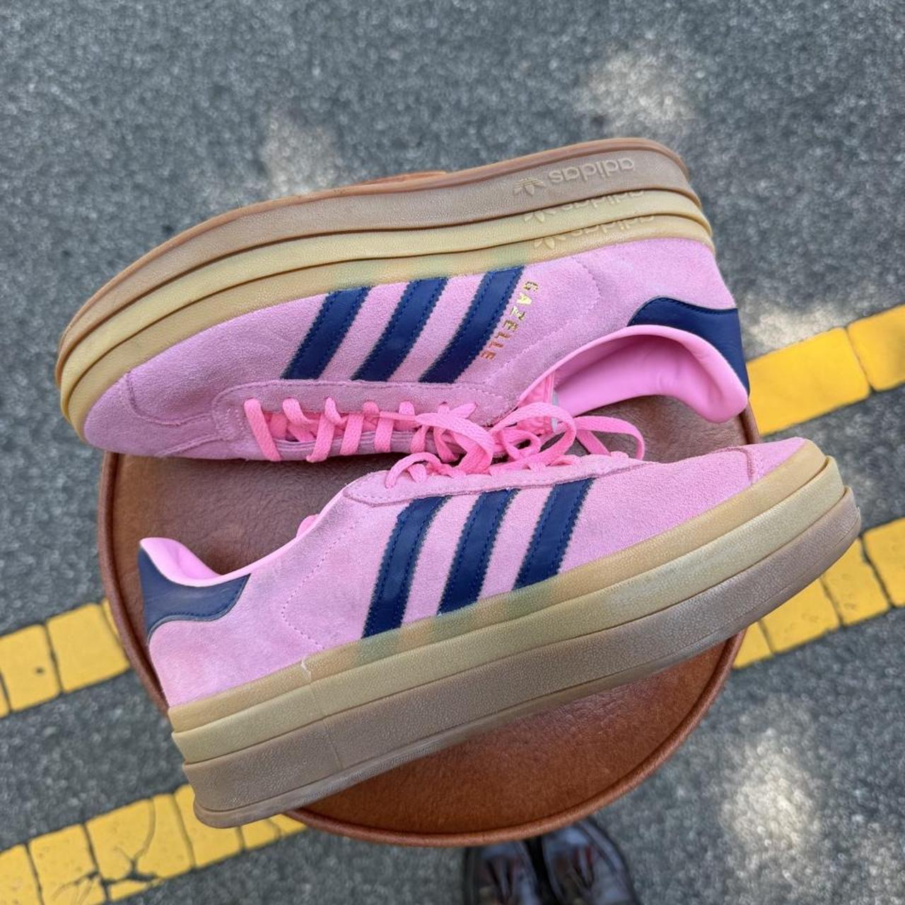 Adidas Originals Gazelle sneakers in pink with navy blue stripes